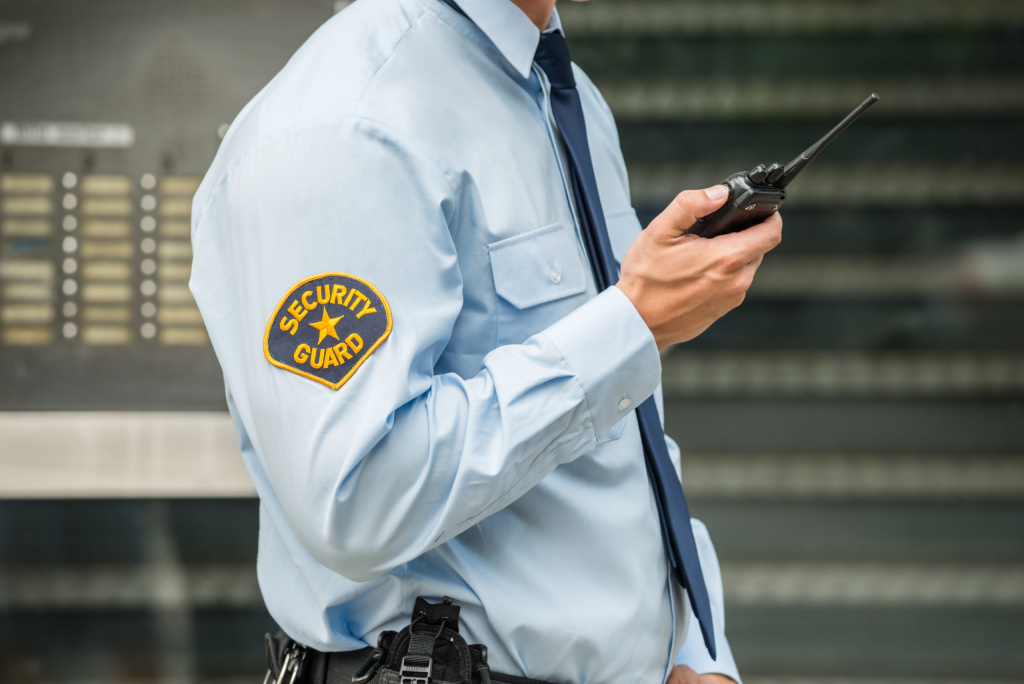 Canva-Security-Guard-Using-Walkie-talkie-scaled.jpg
